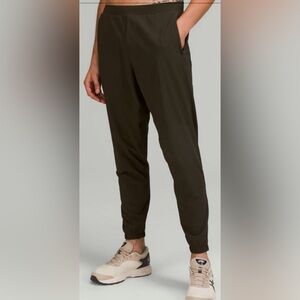 Lululemon Surge Olive Green Jogger Pants TALL Size Medium